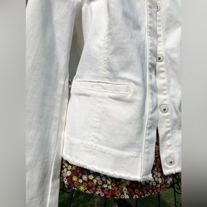 Cabi white Jean jacket with snap front and sleeves.